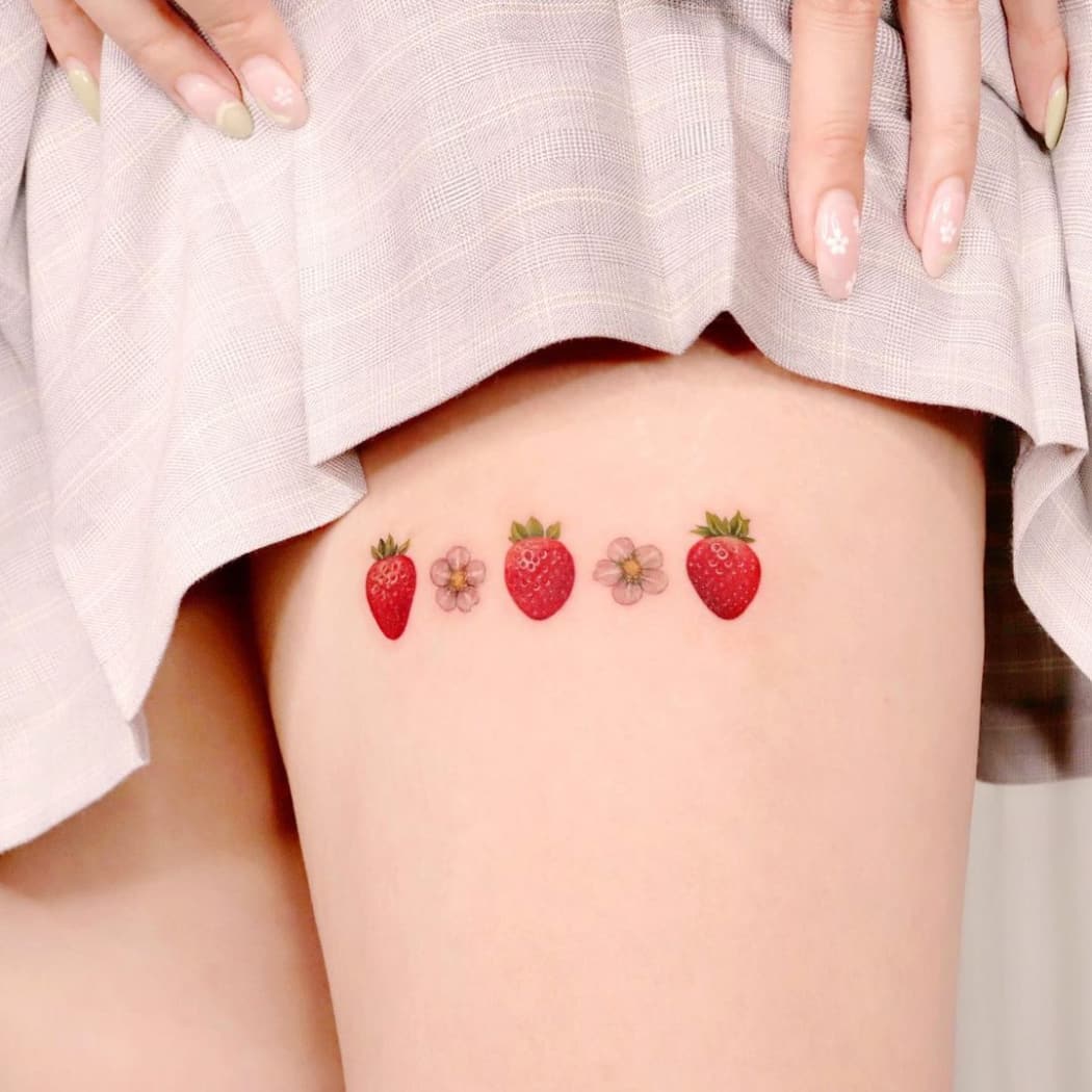 Strawberry Tattoo On Thigh