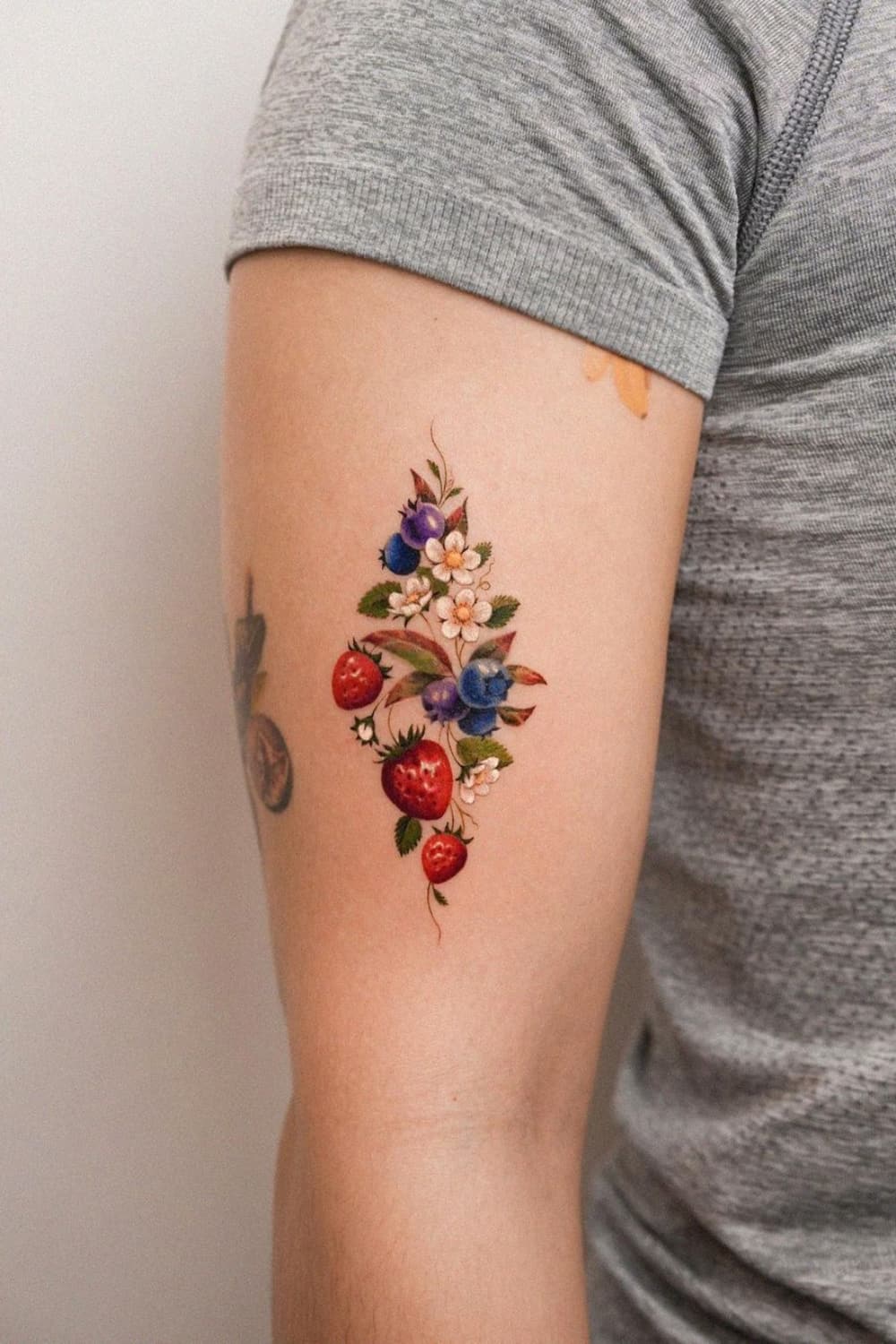 Strawberry Tattoo With Blueberries