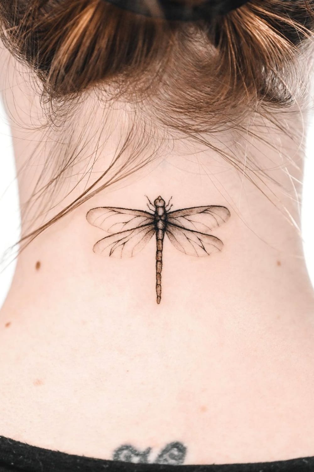 Dragonfly Tattoo On The Neck