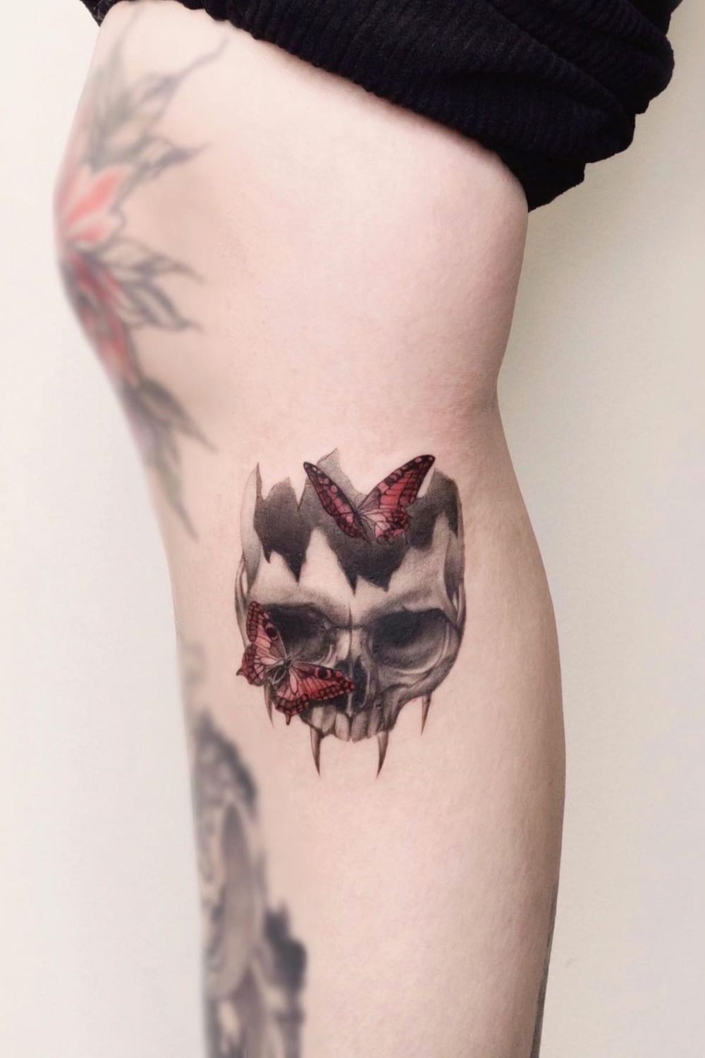 Skull and Red Butterfly Tattoo