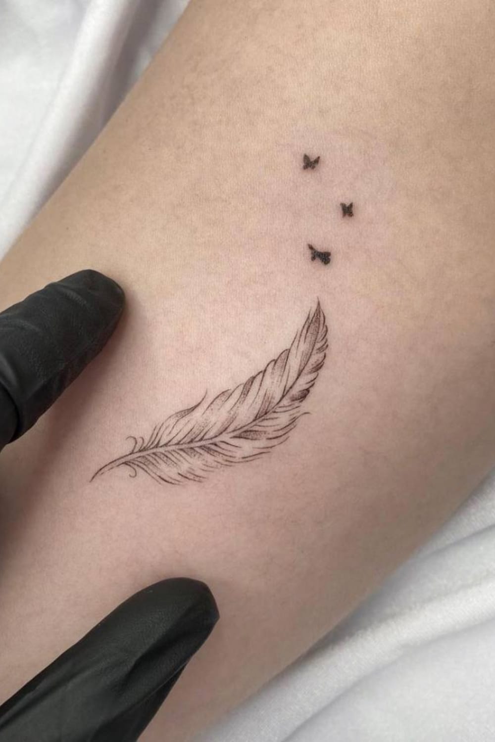 Butterfly and Feather Tattoo