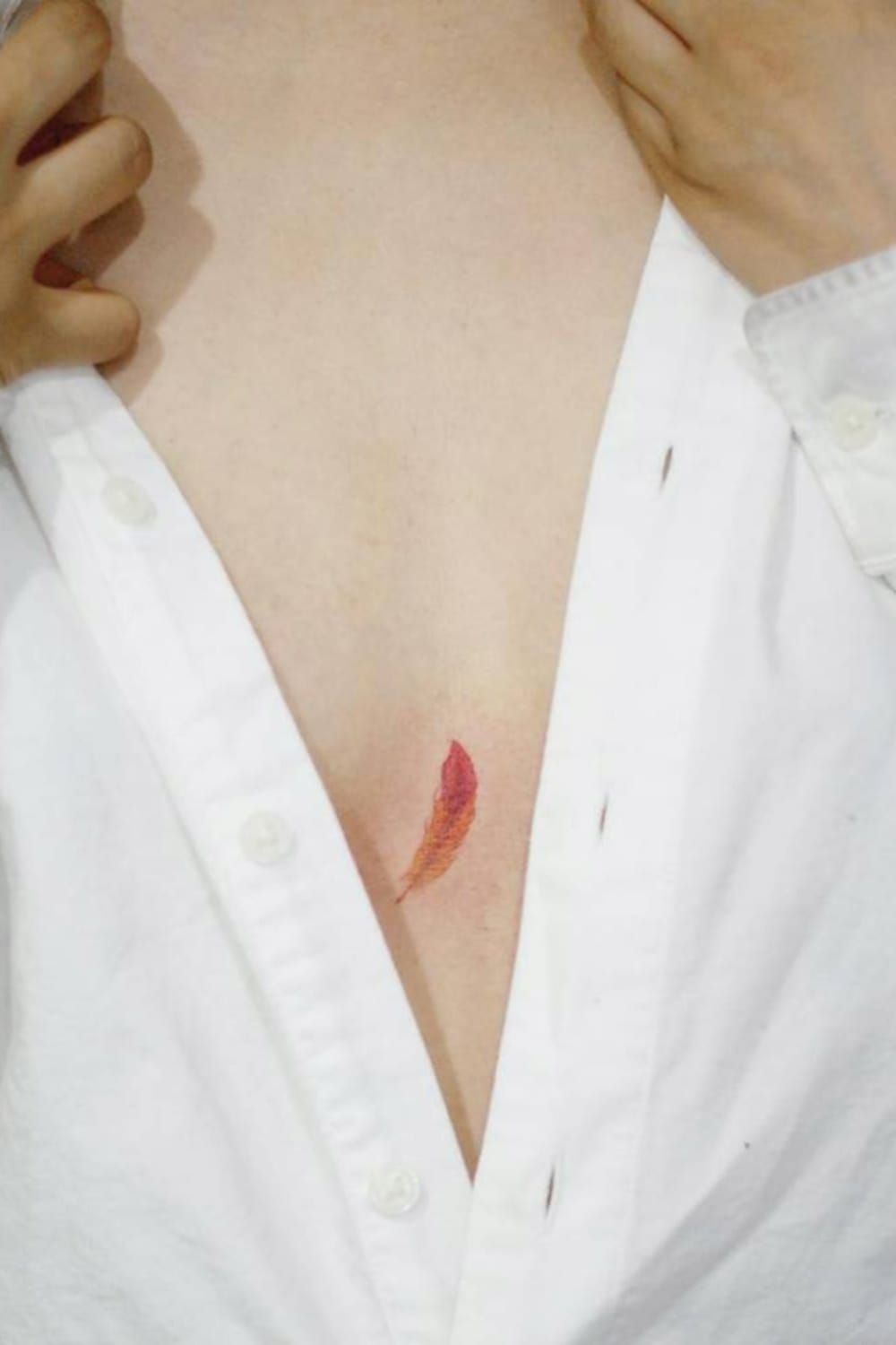 Feather Tattoo on Chest